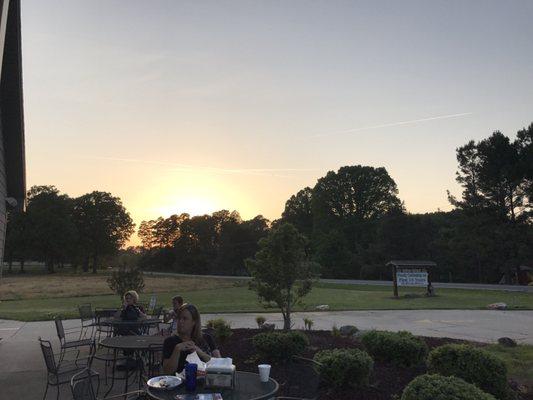 Outdoor seating with pastoral views.