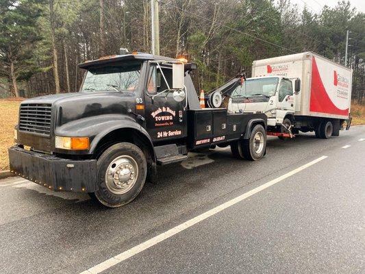 Medium duty to the rescue to transport this box truck to a repair shop!