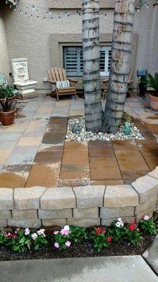 Front patio with a pony wall to create an inviting entertaining area.