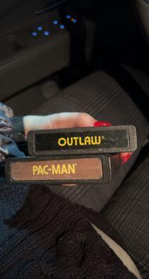 Outlaw and Pac-Man cartridges for Atari 2600. In decent condition, some wear and tear. Playable and still work.