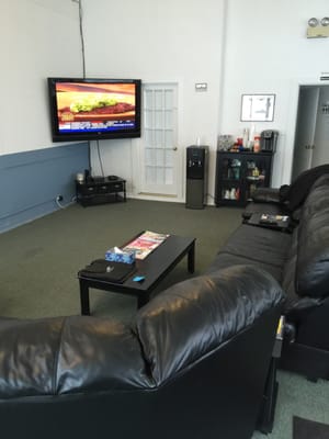 Waiting area with tv, wifi, and a Keurig for coffee and tea.