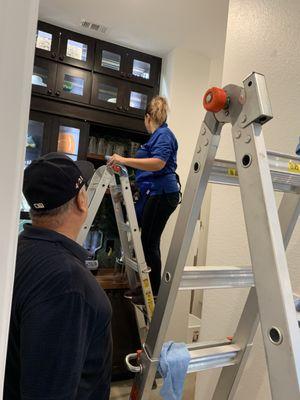 Wiping down the interior and exterior Pantry cabinets