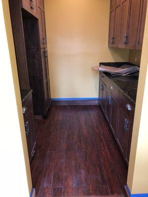 Adding a kitchen storage  cabinets & engineer wood at windermere FL