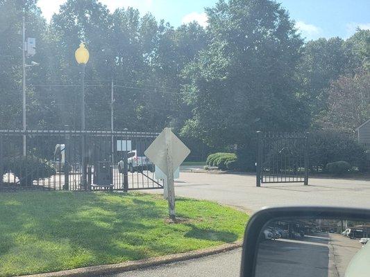 Pictures of the broken front gates at Riverdale apts manager by Sunshine apts