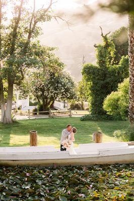 Boat and lush gardens