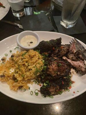 My delicious Jerk Chicken, and Jamaican rice with butter sauce dinner.