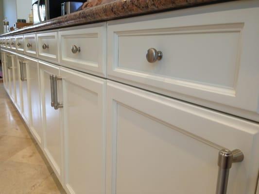 Antique white refinished kitchen cabinets