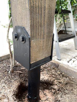 Wood post installed in the metal base