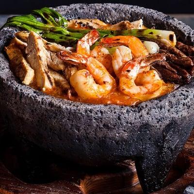 Moctezuma molcajete stone ground bowl of cheesy meat gooey goodness.