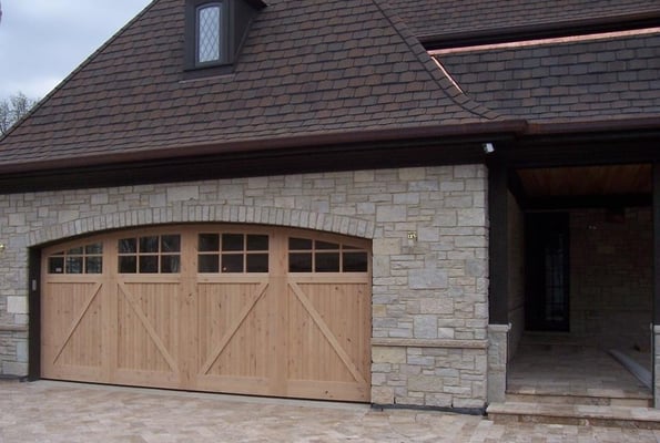 18'x8' Knotty Alder Custom Wood Door with Arched Stockton Glass.