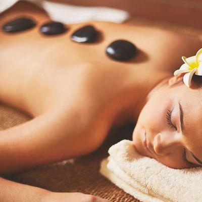 Hot stone oil massage