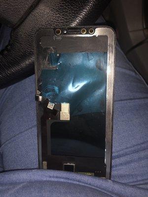 The back of the screen with the plastic that was supposed to be removed still there