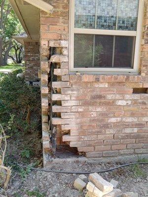 Area where wing wall was attached to the home then knocked down