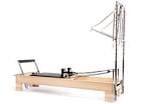 Pilates Reformer and Half Tower in my studio