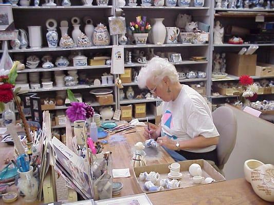 Hand painting Delftware is a time honored tradition at our factory