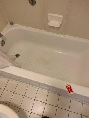 Disgusting stained tub floor