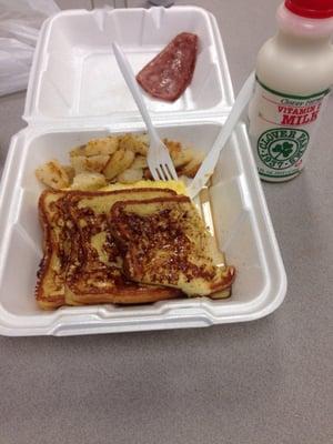 French toast, eggs with cheese, home fries, and turkey bacon.