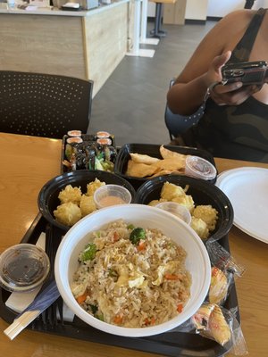 Shrimp tempura, vegetable rice, and cheese wonton, plus salmon roll and shrimp tempura sushi