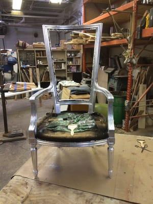 Silver leafing accent chair.