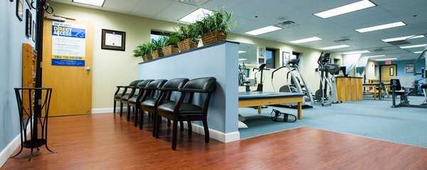 The clean comfortable waiting area at the Shrewsbury location of Atlantic Physical Therapy Center.