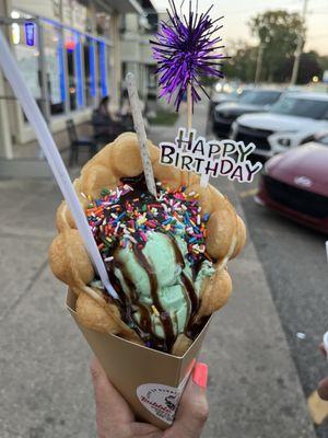 Bubble waffle with mint chocolate chip ice cream, birthday version