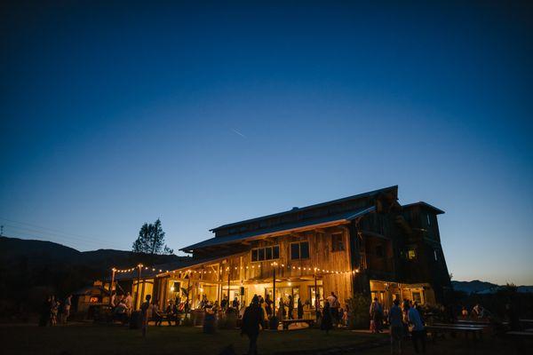 The main house lit up for dancing.  Photo by Gabriel Harber Photography http://harberphotography.com