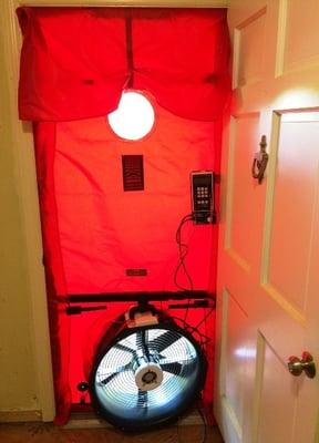 Blower door test to determine building airflow, energy waste, etc.