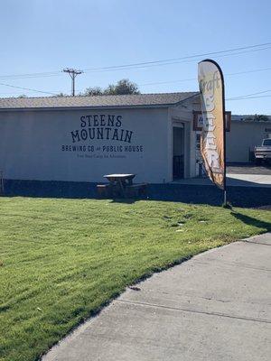 A small public house that looks to be converted from a garage.