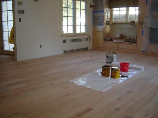 Installation & staining of wide plank flooring.