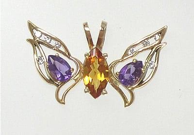 Citrine and Amethyst Butterfly accented with Diamonds.