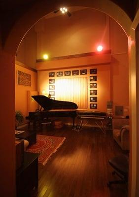 The Lounge features a Yamaha C7 acoustic grand piano.