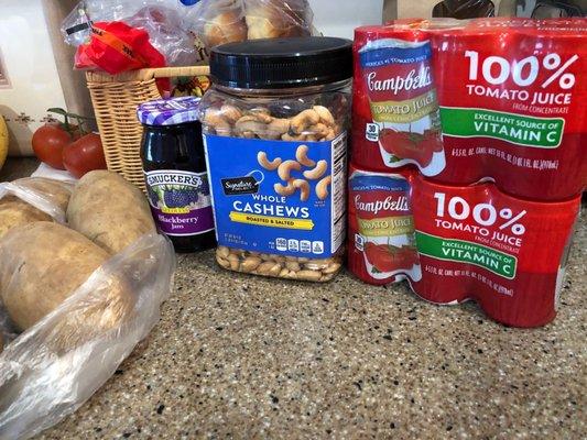 Family favorites: Cambell Tomato juice blackberry jam, cashews and great looking russet potatoes