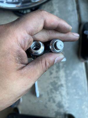 Lug bolts broken off inside of lug nuts.