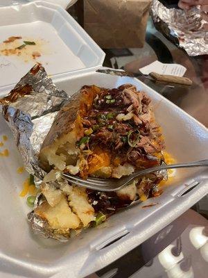 Meal in a Peel (loaded baked potato with pulled pork)