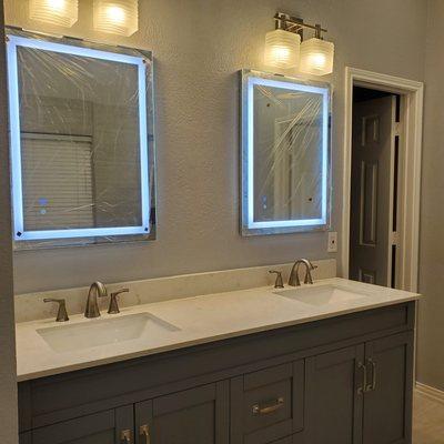 Electricity, plumbing, and vanity installation in plano tx.