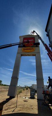 large monument sign with gas pricers