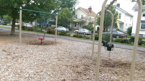 Swings, plus two other big kid swings further away