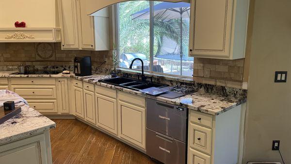 after countertop install and cabinet door painting.