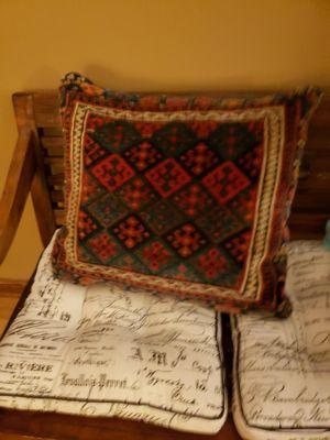 An antique Armenian Rug that Kings Upholstery made into a functional pillow, the back is suede. Amazing!