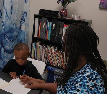 Student practicing writing his new words