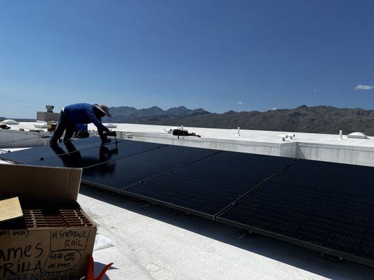 Panels getting placed on a flat roof