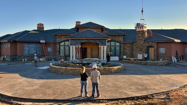 A house in Gillette, Wy after installing 3 chimney caps, copper gutters, and have yet to install copper to wrap their 12 columns.