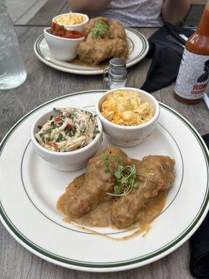 Smothered chicken w/ coleslaw and macncheese