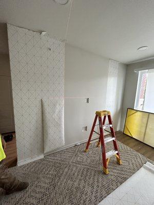 A start of a wall paper installation