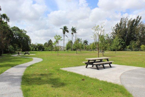 Walking trail with many picnic tables