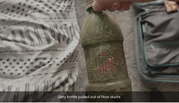 Dirty bottle pulled out of floor ducts