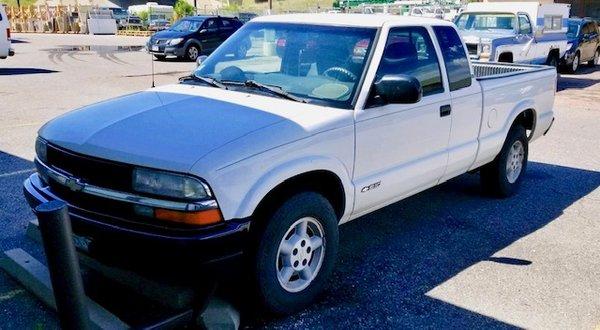 We also buy older vehicles requiring minor repairs and rebuild engines, like this truck.