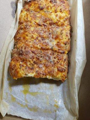 Cheesy bread, nicely flavored with garlic and stuffed with cheese.