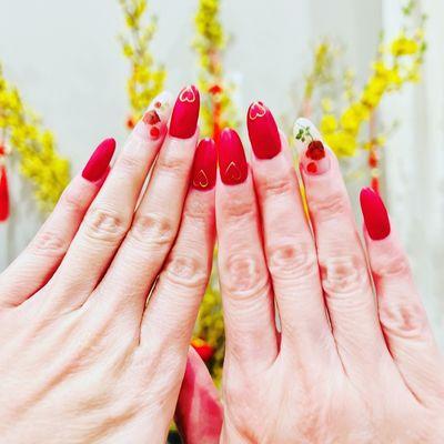 Red nail and red roses