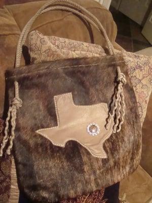 custom cowhide and leather bag with vintage rope handle